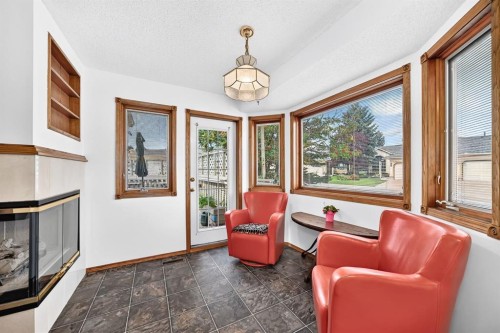 8 Sunlake Close Se, Calgary, AB - Indoor With Fireplace