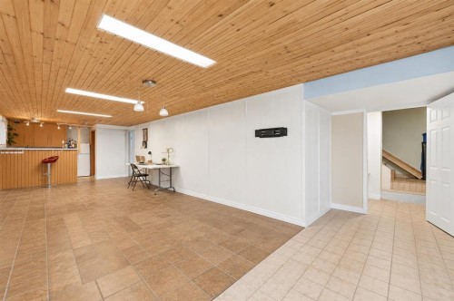 6024 Madigan Drive Ne, Calgary, AB - Indoor Photo Showing Other Room