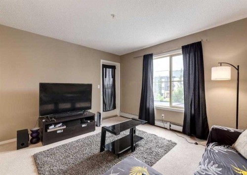 2307-1317 27 Street Se, Calgary, AB - Indoor Photo Showing Living Room