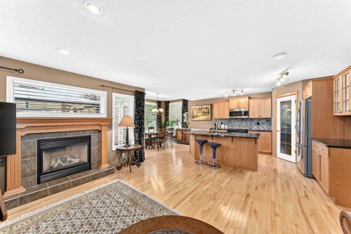 144 Cougarstone Common Sw, Calgary, AB - Indoor With Fireplace