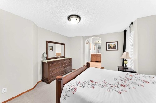 144 Cougarstone Common Sw, Calgary, AB - Indoor Photo Showing Bedroom