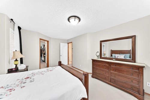 144 Cougarstone Common Sw, Calgary, AB - Indoor Photo Showing Bedroom