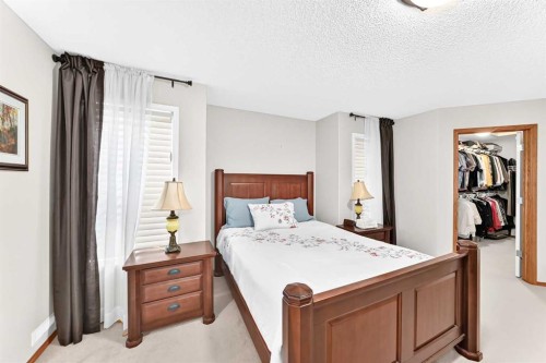 144 Cougarstone Common Sw, Calgary, AB - Indoor Photo Showing Bedroom