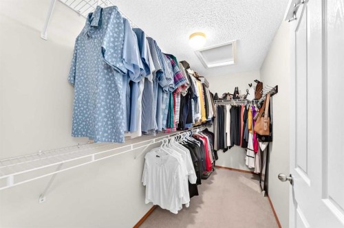 144 Cougarstone Common Sw, Calgary, AB - Indoor With Storage
