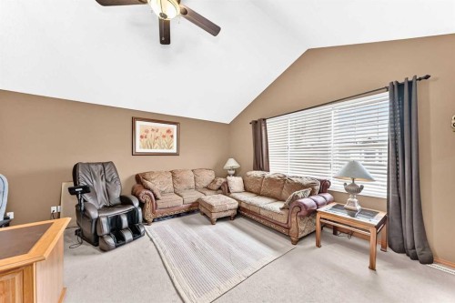 144 Cougarstone Common Sw, Calgary, AB - Indoor Photo Showing Living Room