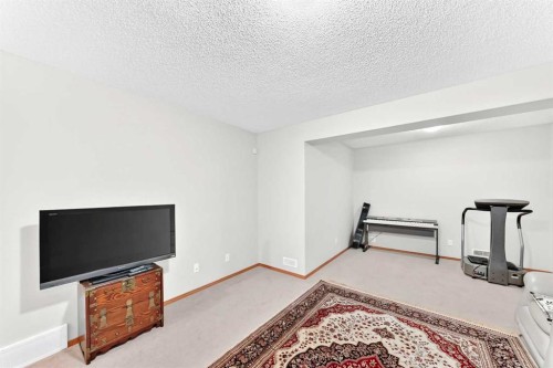 144 Cougarstone Common Sw, Calgary, AB - Indoor Photo Showing Other Room