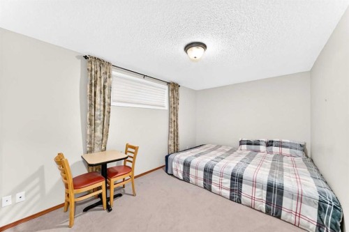 144 Cougarstone Common Sw, Calgary, AB - Indoor Photo Showing Bedroom