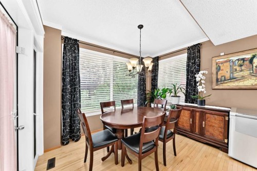 144 Cougarstone Common Sw, Calgary, AB - Indoor Photo Showing Dining Room
