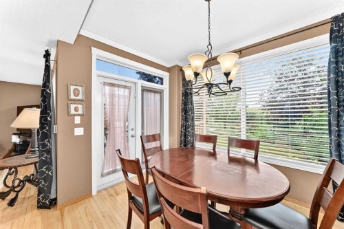 144 Cougarstone Common Sw, Calgary, AB - Indoor Photo Showing Dining Room