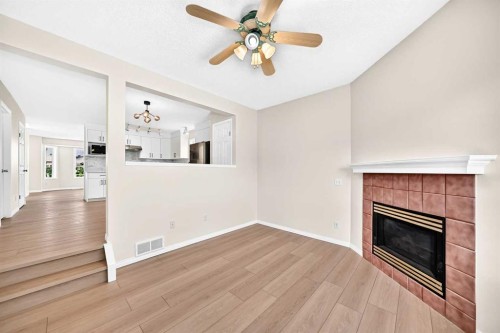 94 Arbour Wood Mews Nw, Calgary, AB - Indoor With Fireplace
