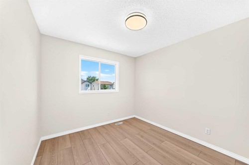 94 Arbour Wood Mews Nw, Calgary, AB - Indoor Photo Showing Other Room