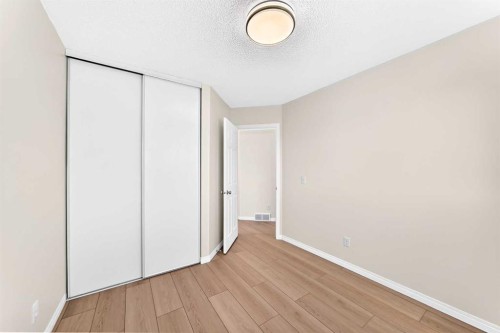 94 Arbour Wood Mews Nw, Calgary, AB - Indoor Photo Showing Other Room