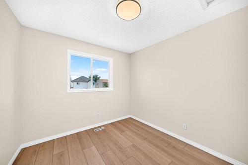 94 Arbour Wood Mews Nw, Calgary, AB - Indoor Photo Showing Other Room