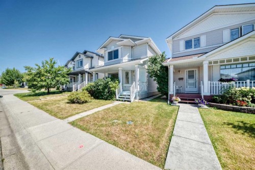 94 Arbour Wood Mews Nw, Calgary, AB - Outdoor With Deck Patio Veranda With Facade