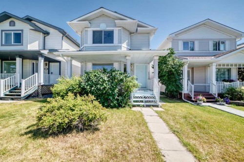 94 Arbour Wood Mews Nw, Calgary, AB - Outdoor With Deck Patio Veranda With Facade