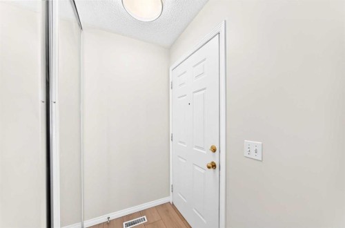 94 Arbour Wood Mews Nw, Calgary, AB - Indoor Photo Showing Other Room