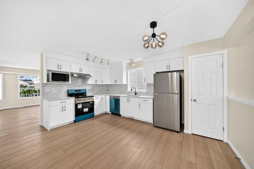 94 Arbour Wood Mews Nw, Calgary, AB - Indoor Photo Showing Kitchen