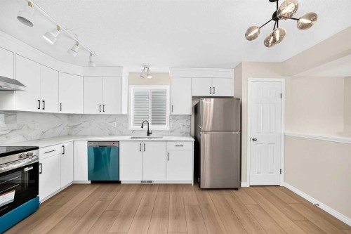 94 Arbour Wood Mews Nw, Calgary, AB - Indoor Photo Showing Kitchen