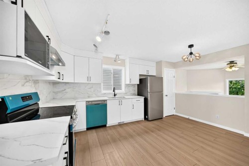 94 Arbour Wood Mews Nw, Calgary, AB - Indoor Photo Showing Kitchen