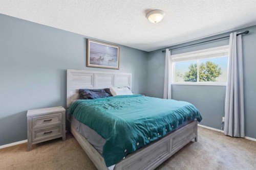 271 Erin Meadow Close Se, Calgary, AB - Indoor Photo Showing Bedroom