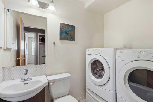 271 Erin Meadow Close Se, Calgary, AB - Indoor Photo Showing Laundry Room