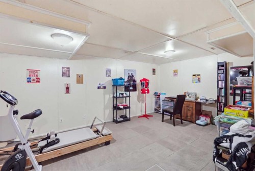 271 Erin Meadow Close Se, Calgary, AB - Indoor Photo Showing Gym Room