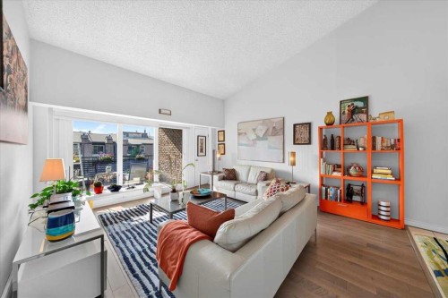 2410-202 Braeglen Close Sw, Calgary, AB - Indoor Photo Showing Living Room