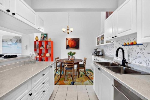 2410-202 Braeglen Close Sw, Calgary, AB - Indoor Photo Showing Kitchen With Double Sink