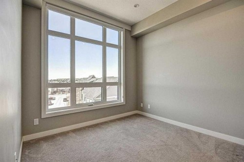 401-145 Burma Star Road Sw, Calgary, AB - Indoor Photo Showing Other Room