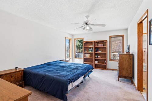 48 Headlands Close, Cochrane, AB - Indoor Photo Showing Bedroom