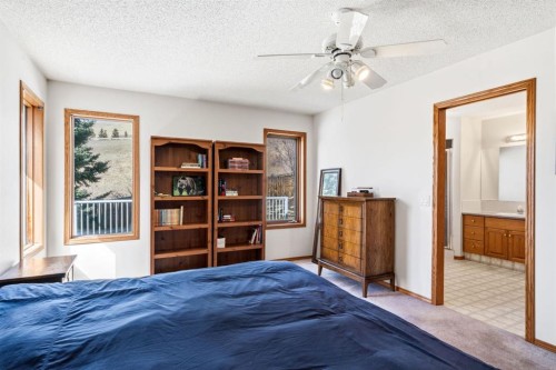 48 Headlands Close, Cochrane, AB - Indoor Photo Showing Bedroom