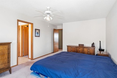 48 Headlands Close, Cochrane, AB - Indoor Photo Showing Bedroom