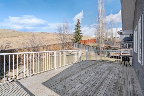 48 Headlands Close, Cochrane, AB - Outdoor With Deck Patio Veranda
