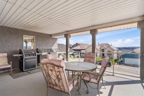 48 Headlands Close, Cochrane, AB - Outdoor With Deck Patio Veranda With Exterior