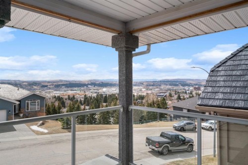 48 Headlands Close, Cochrane, AB - Outdoor With View With Exterior
