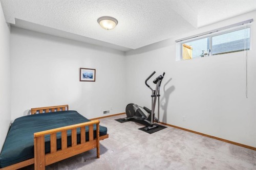 48 Headlands Close, Cochrane, AB - Indoor Photo Showing Bedroom