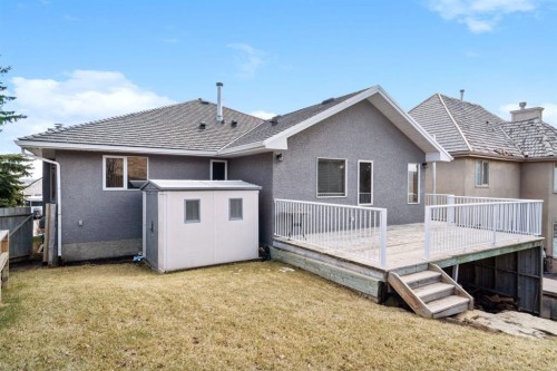 48 Headlands Close, Cochrane, AB - Outdoor With Deck Patio Veranda With Exterior