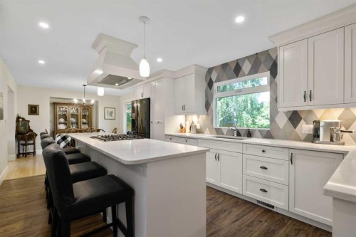 315 Woodpark Place Sw, Calgary, AB - Indoor Photo Showing Kitchen With Upgraded Kitchen