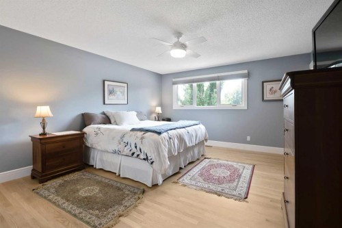 315 Woodpark Place Sw, Calgary, AB - Indoor Photo Showing Bedroom
