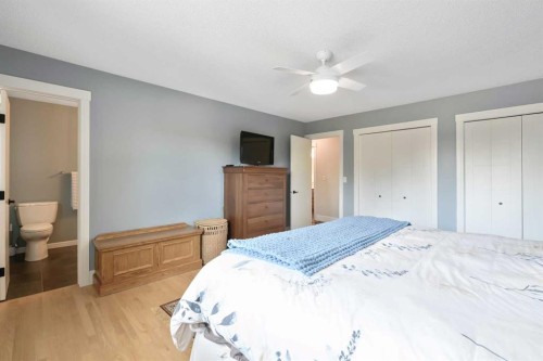315 Woodpark Place Sw, Calgary, AB - Indoor Photo Showing Bedroom