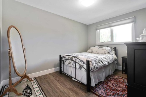 315 Woodpark Place Sw, Calgary, AB - Indoor Photo Showing Bedroom