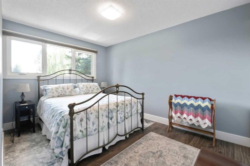 315 Woodpark Place Sw, Calgary, AB - Indoor Photo Showing Bedroom