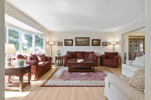 315 Woodpark Place Sw, Calgary, AB - Indoor Photo Showing Living Room