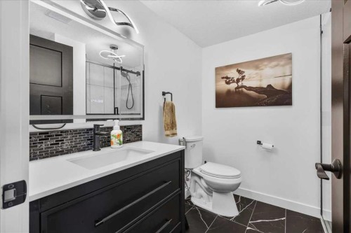 61 Hanson Lane Ne, Langdon, AB - Indoor Photo Showing Bathroom