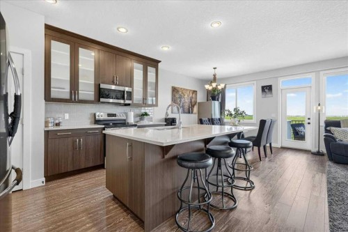61 Hanson Lane Ne, Langdon, AB - Indoor Photo Showing Kitchen With Upgraded Kitchen