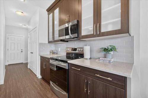 61 Hanson Lane Ne, Langdon, AB - Indoor Photo Showing Kitchen