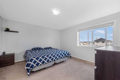 2 Saddlefield Crescent Ne, Calgary, AB - Indoor Photo Showing Bedroom