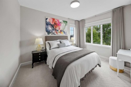 656 Quarry Way Se, Calgary, AB - Indoor Photo Showing Bedroom