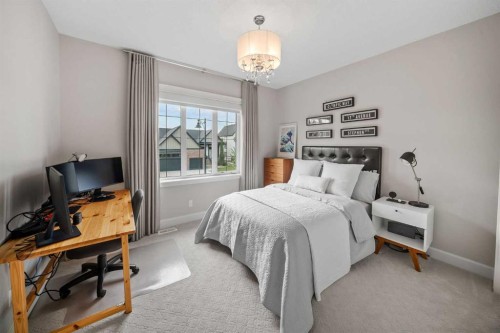 656 Quarry Way Se, Calgary, AB - Indoor Photo Showing Bedroom