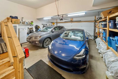 656 Quarry Way Se, Calgary, AB - Indoor Photo Showing Garage